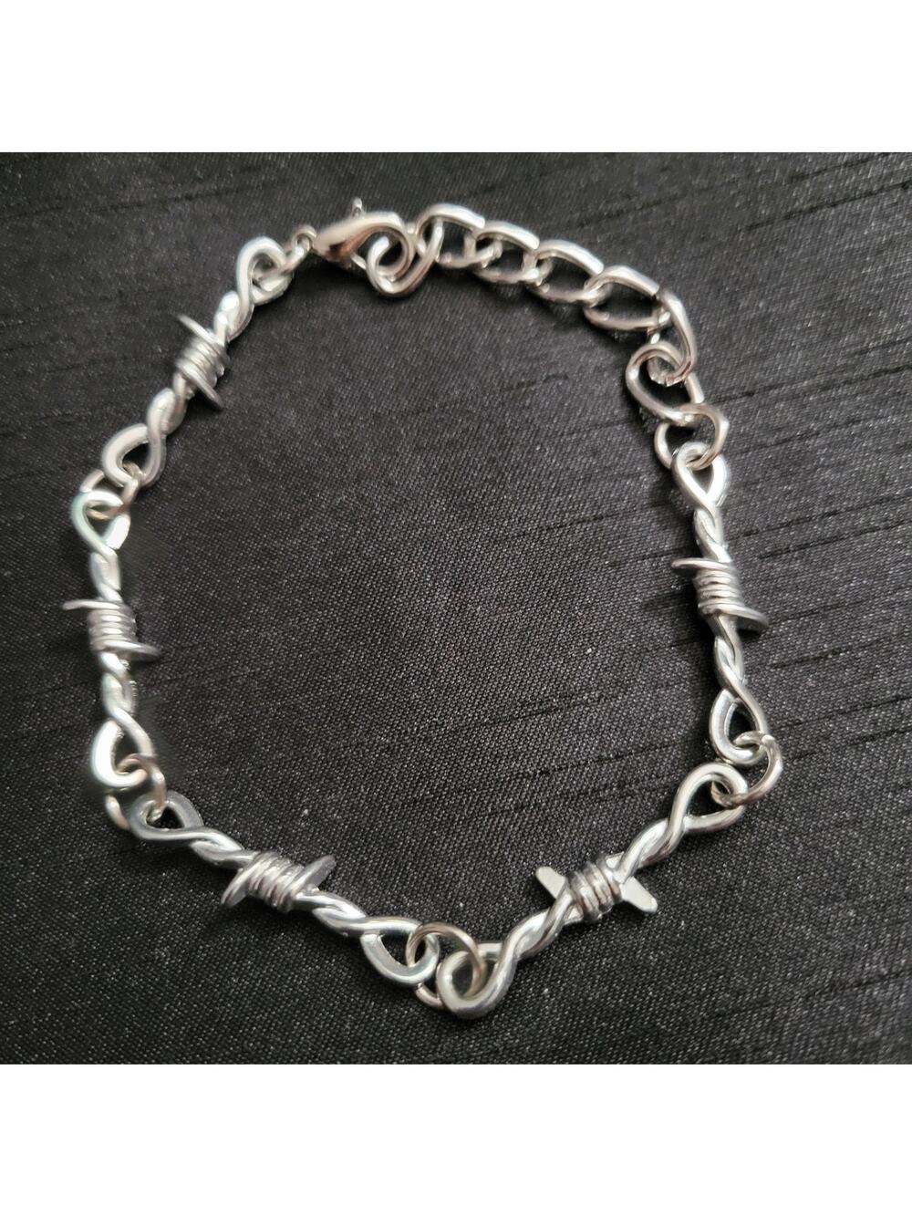 Barbed wire silver tone bracelet
